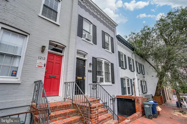 a front view of a multi story residential apartment building