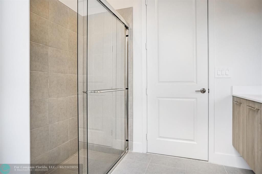 12328 Southwest 43rd Street Davie, FL 33330 - Photo 23 of 96 a bathroom with a shower