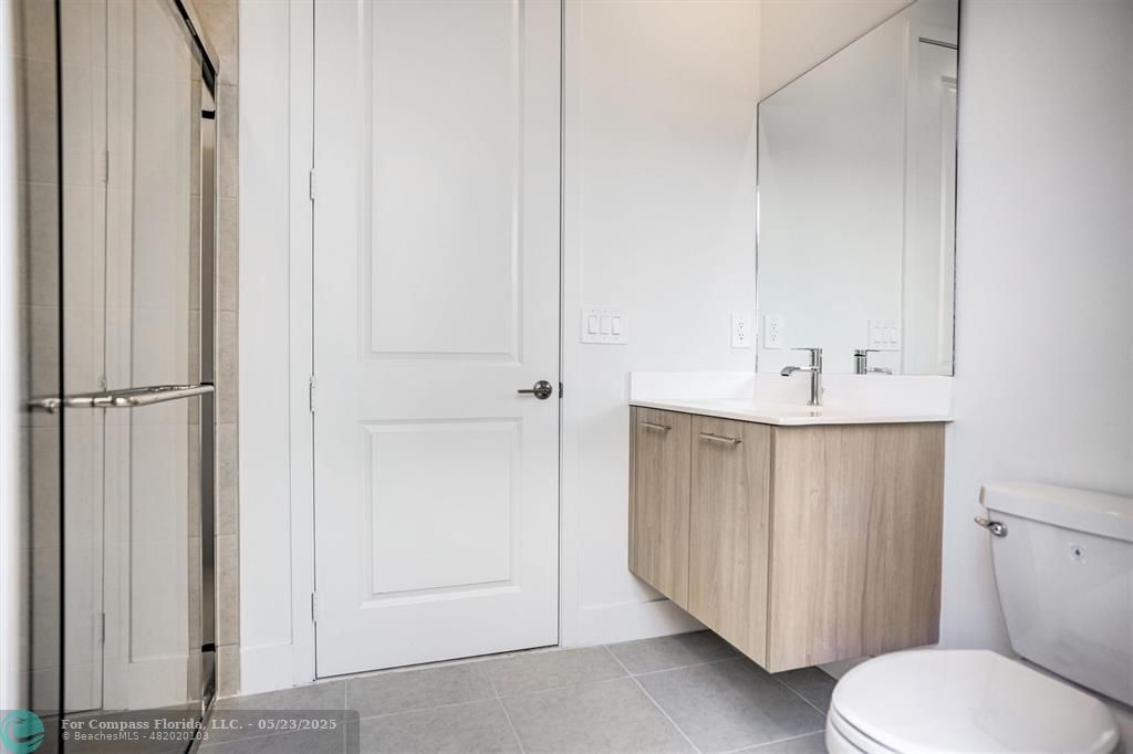 12328 Southwest 43rd Street Davie, FL 33330 - Photo 24 of 96 a bathroom with a sink and a toilet