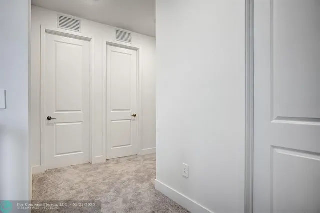 a bathroom with a toilet and shower