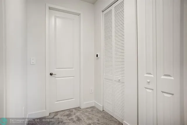 an aerial view of a swimming pool patio and mountain view