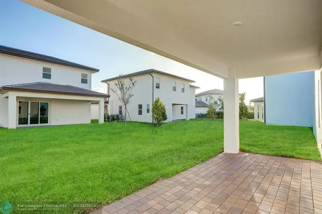 a bed room with furniture and a chandelier