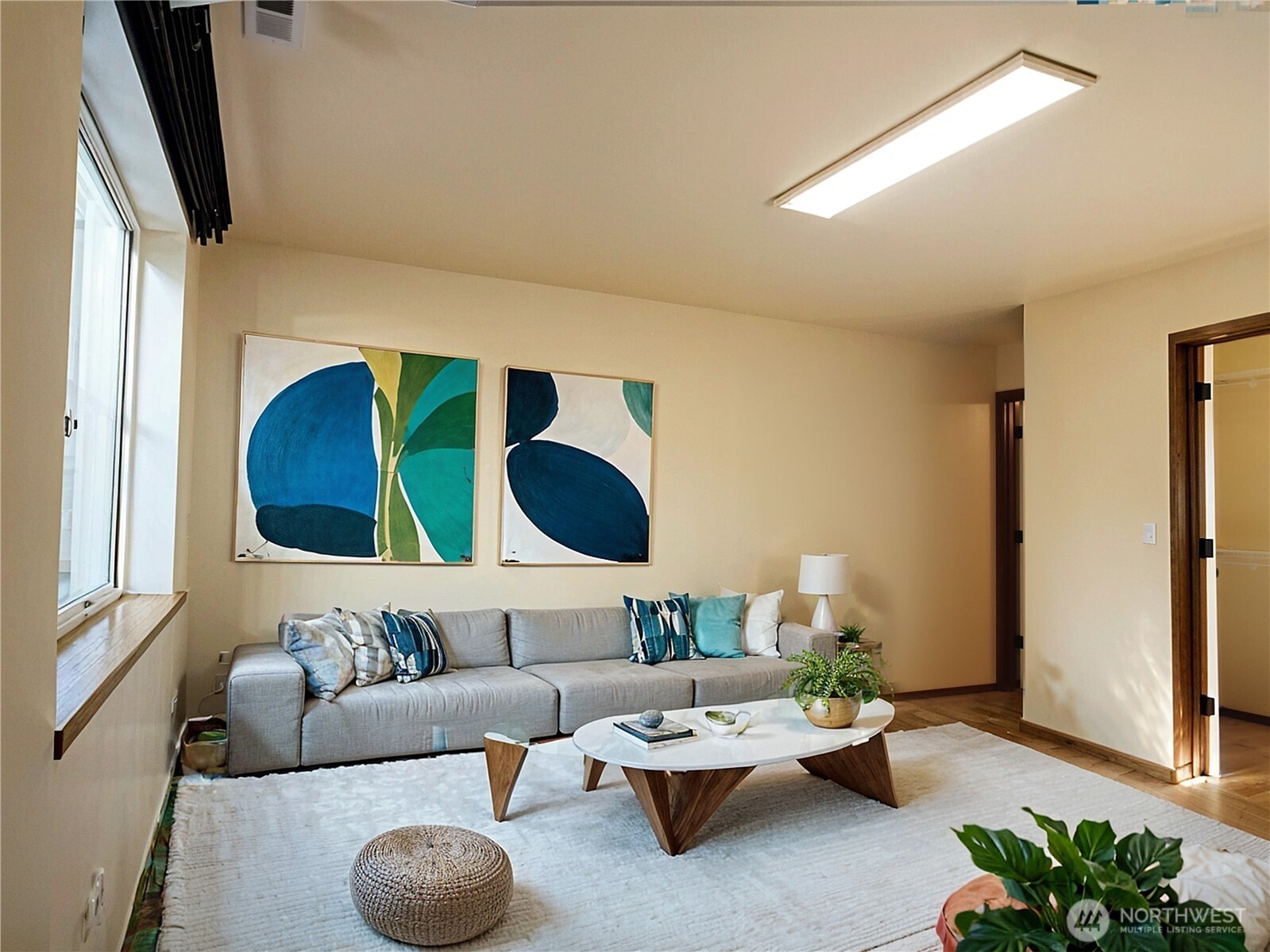 5451 32nd Avenue Southwest Seattle, WA 98126 - Photo 22 of 35 a living room with furniture and a large window