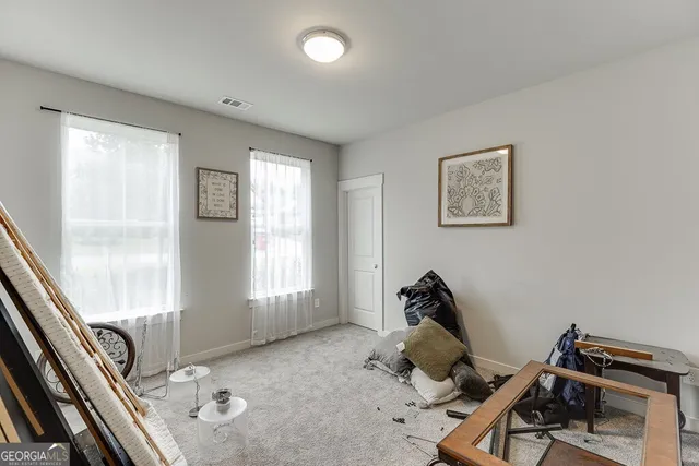 a room with furniture and windows