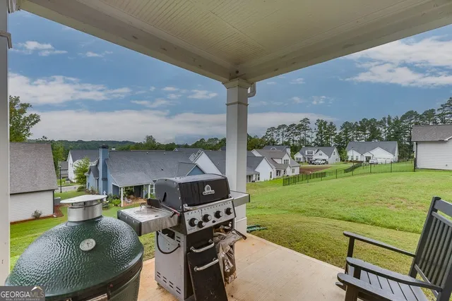 a view of a patio with furniture