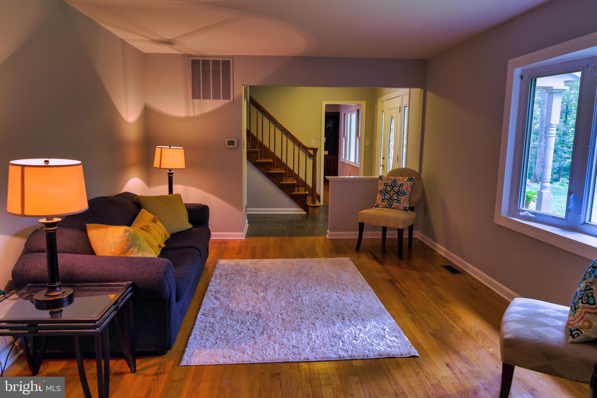 7404 Dance Hall Road Frederick, MD 21701 - Photo 14 of 55 All hardwood in front living room with bay window