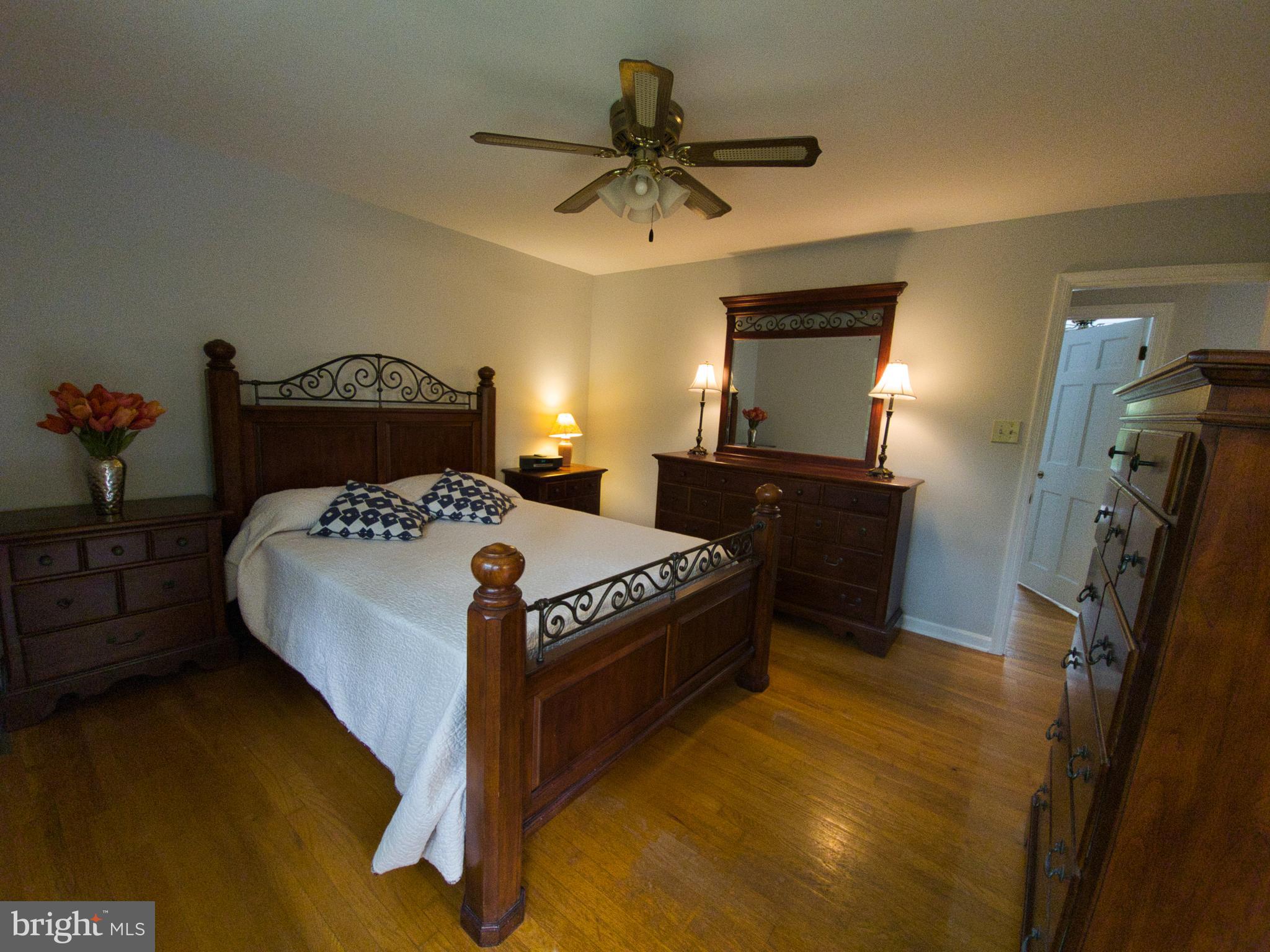 7404 Dance Hall Road Frederick, MD 21701 - Photo 22 of 55 Master bedroom of main home - hardwood!