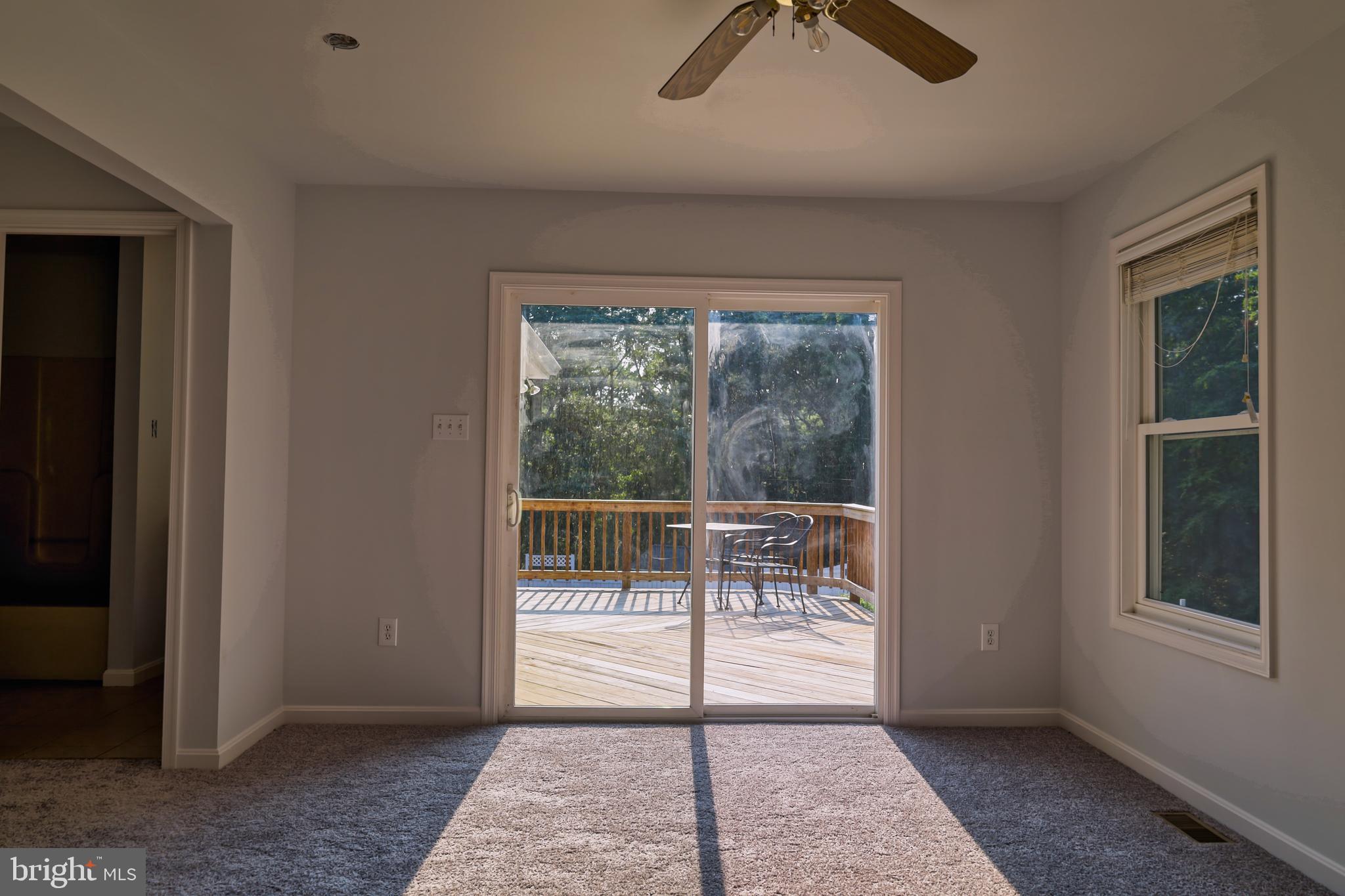 7404 Dance Hall Road Frederick, MD 21701 - Photo 48 of 55 In-law home bedroom has glass doors to deck