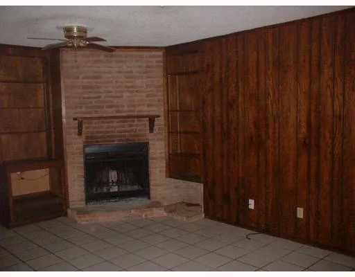 a bathroom with a sink and a fireplace