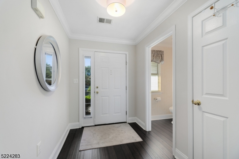 13 Knox Court Bernards, NJ 07920 - Photo 2 of 16 a view of a hallway with wooden floor