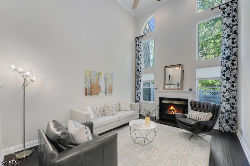 13 Knox Court Bernards, NJ 07920 - Photo 3 of 16 a living room with furniture and a fireplace