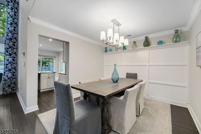 13 Knox Court Bernards, NJ 07920 - Photo 4 of 16 a view of a dining room with furniture and wooden floor