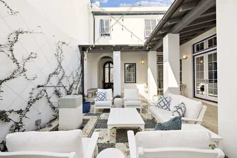 a view of a livingroom with furniture and window