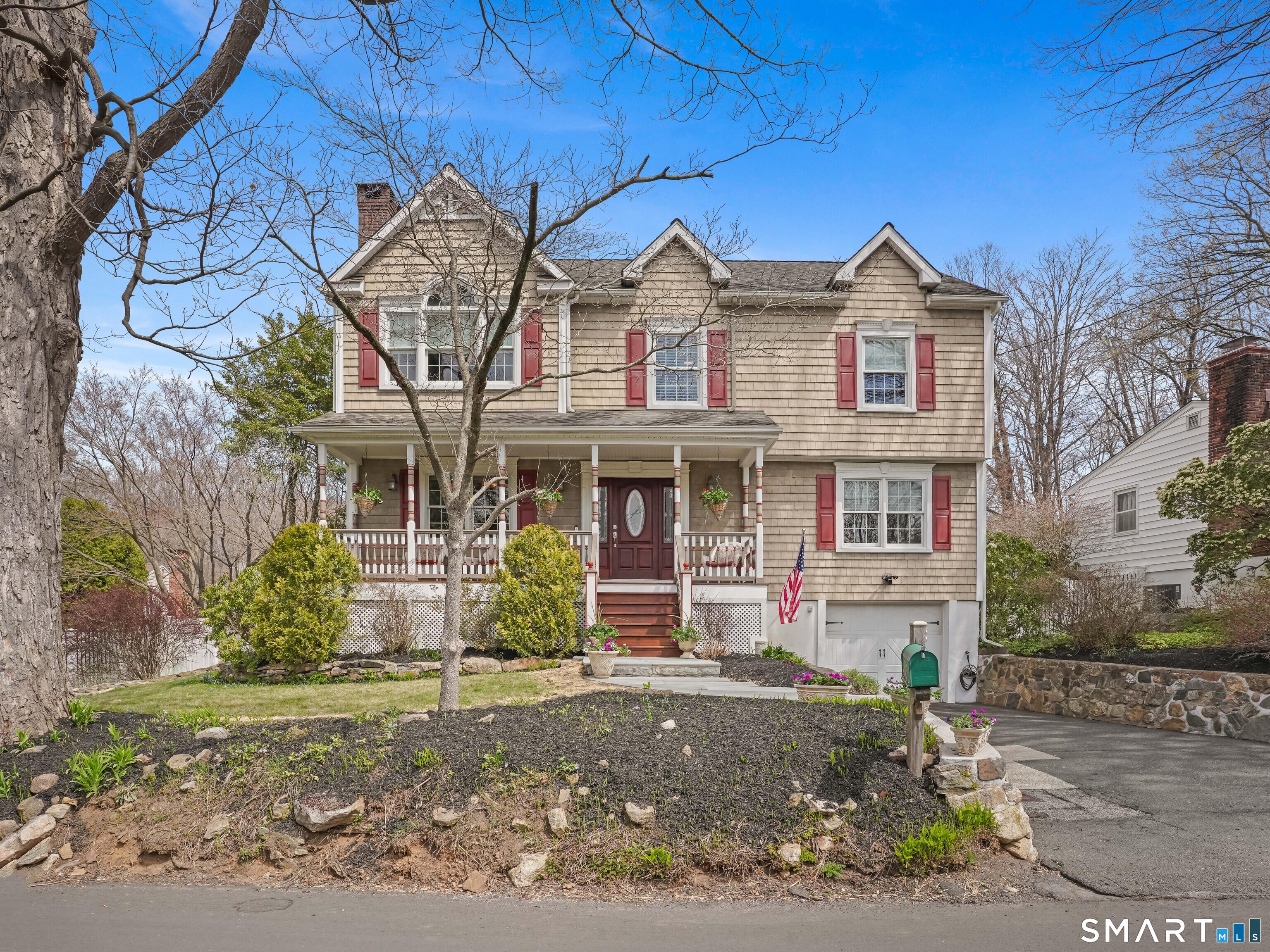82 Ramapoo Road Ridgefield, CT 06877 - Photo 39 of 40 a front view of a house with garden