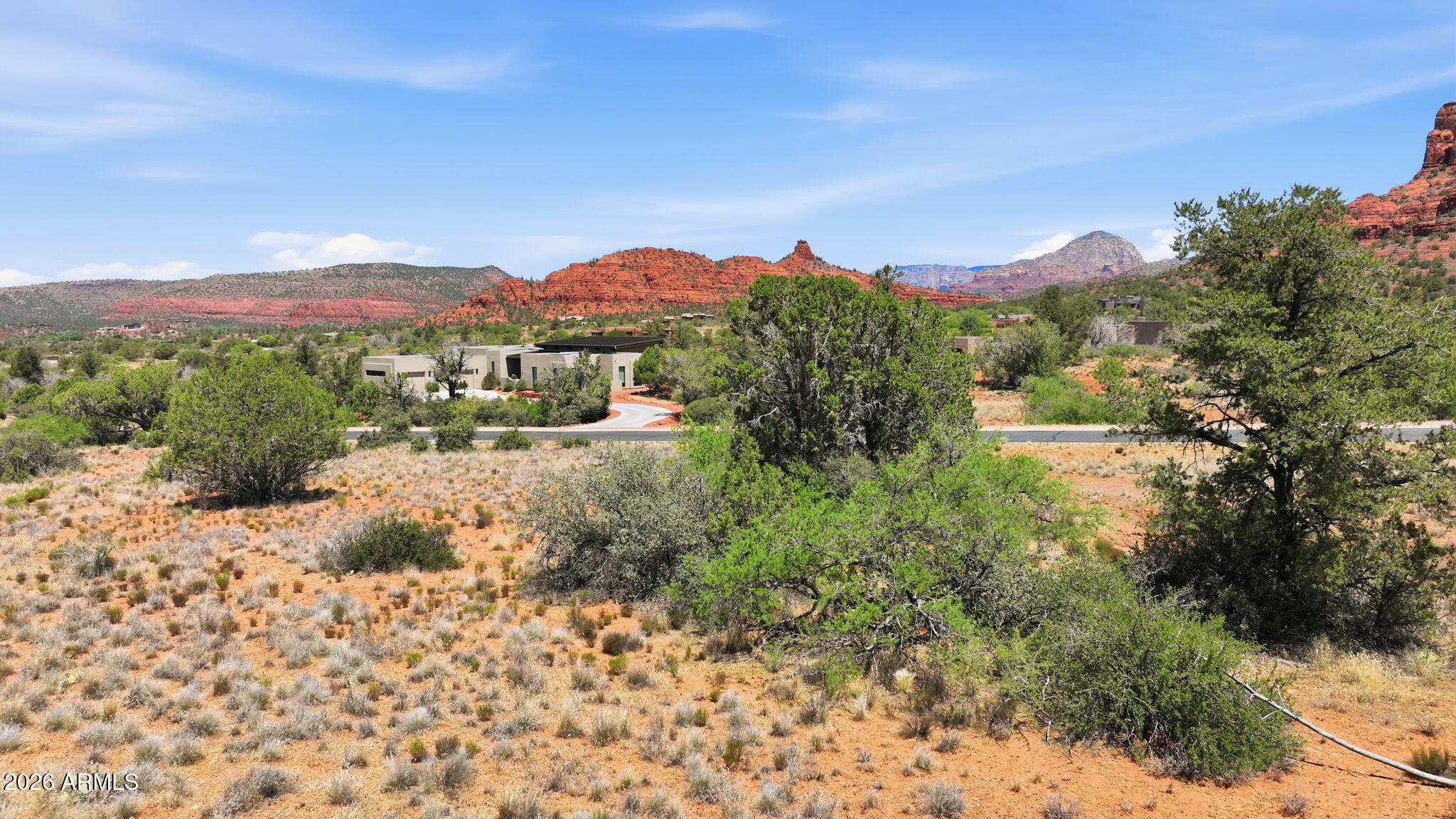 145 Little Park Road, Unit 10 Sedona, AZ 86351 - Photo 9 of 19 a view of a city with lush green forest