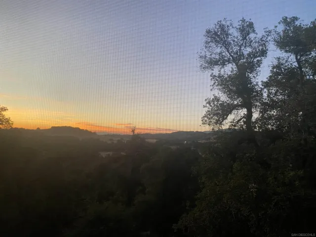 a view of mountain view with mountains in background