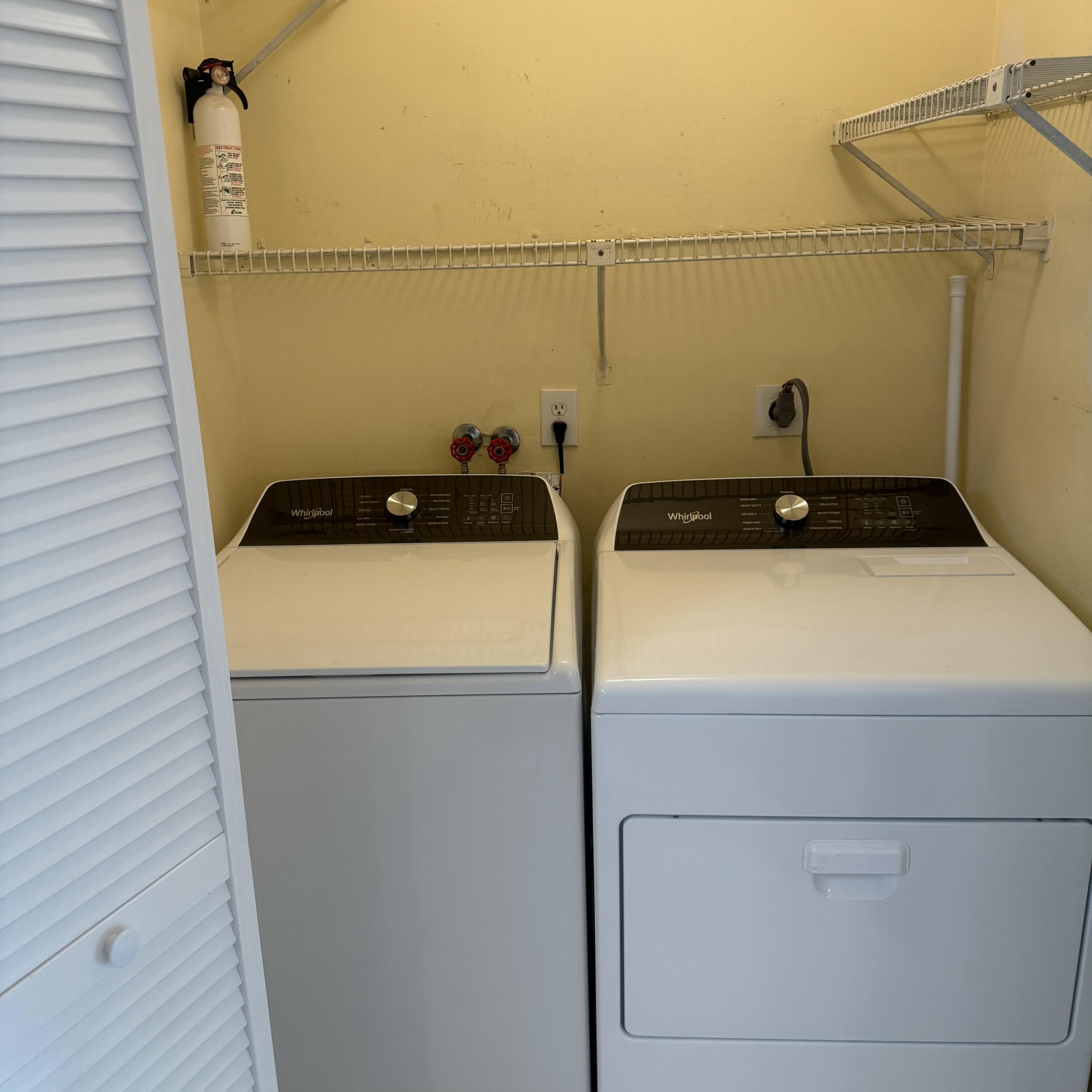 431 Jupiter Lakes Boulevard, Unit 2112A Jupiter, FL 33458 - Photo 17 of 19 a utility room with dryer and washer