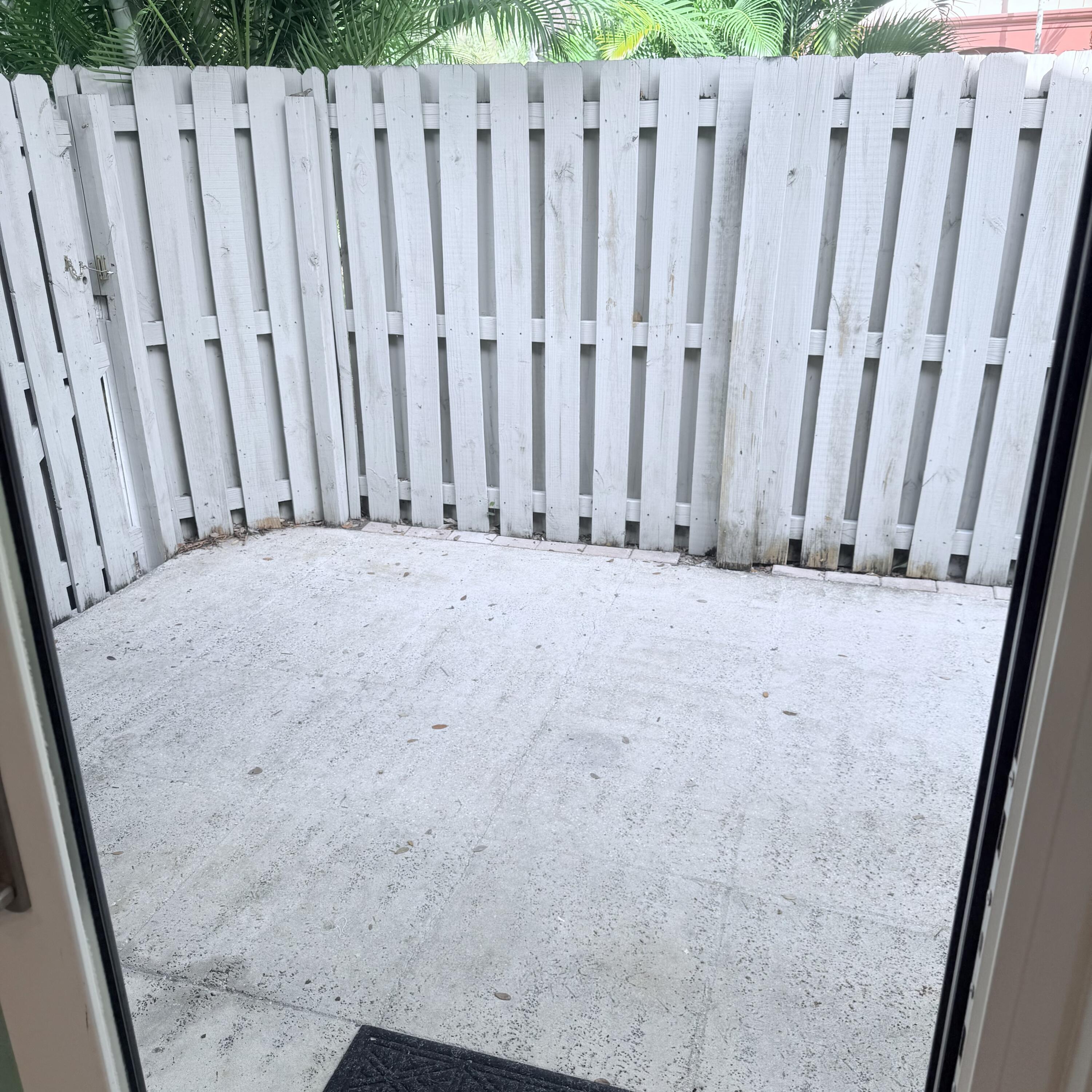 431 Jupiter Lakes Boulevard, Unit 2112A Jupiter, FL 33458 - Photo 8 of 19 a view of wooden fence