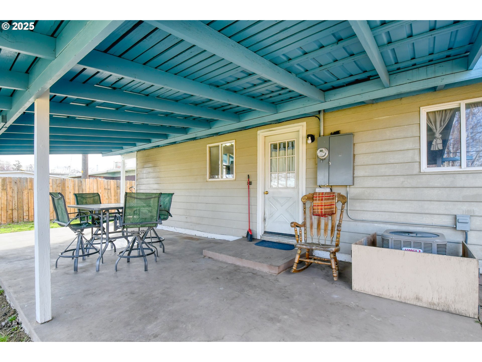 2805 Southwest Marshall Avenue Pendleton, OR 97801 - Photo 33 of 36 a view of a patio with table and chairs and potted plants
