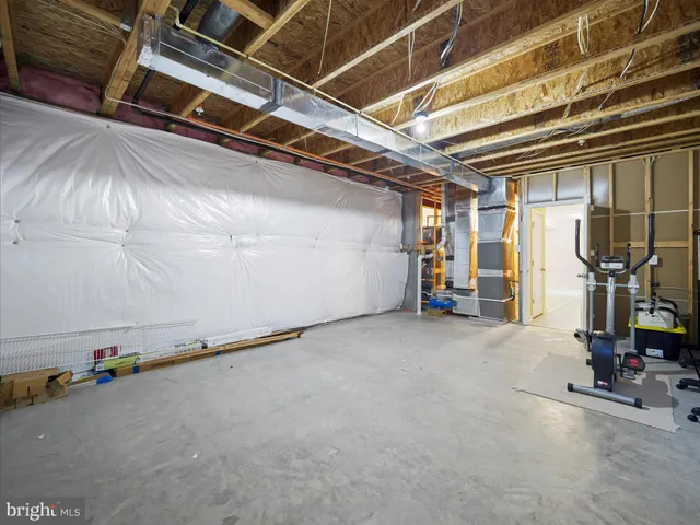a view of a chair and table on the deck
