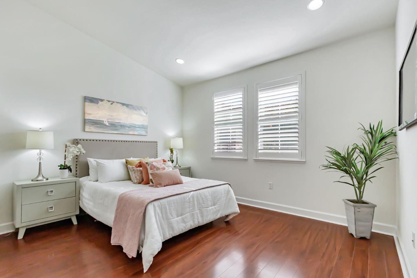 1142 Mente Linda Loop Milpitas, CA 95035 - Photo 15 of 36 a bedroom with bed and a window