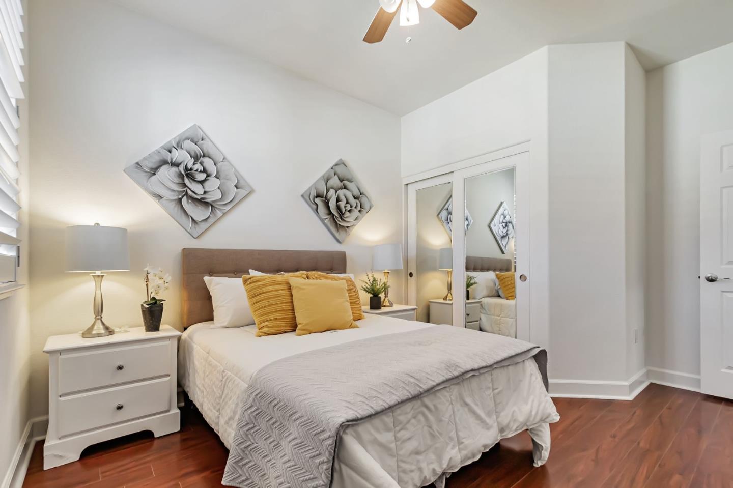 1142 Mente Linda Loop Milpitas, CA 95035 - Photo 20 of 36 a bedroom with a bed and wooden floor