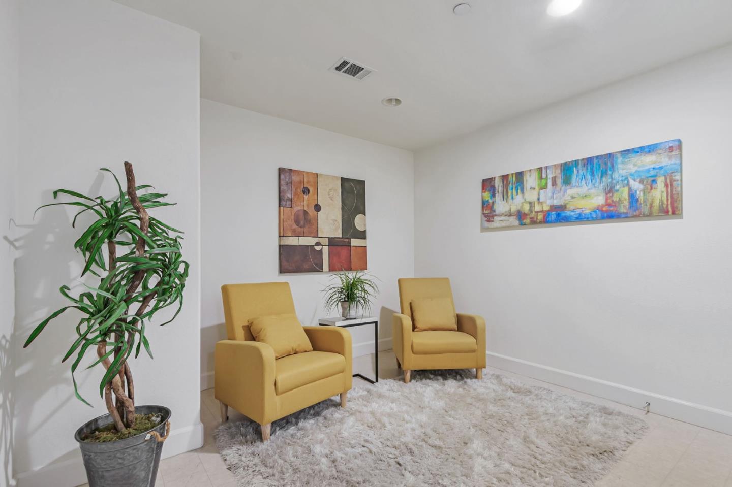 1142 Mente Linda Loop Milpitas, CA 95035 - Photo 26 of 36 a living room with furniture and a potted plant