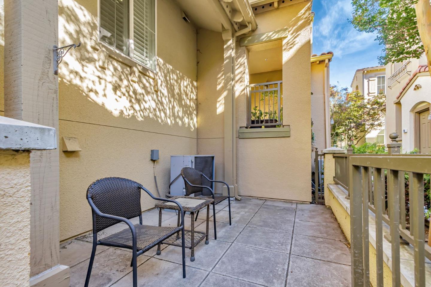 1142 Mente Linda Loop Milpitas, CA 95035 - Photo 29 of 36 a view of a patio with table and chairs and potted plants