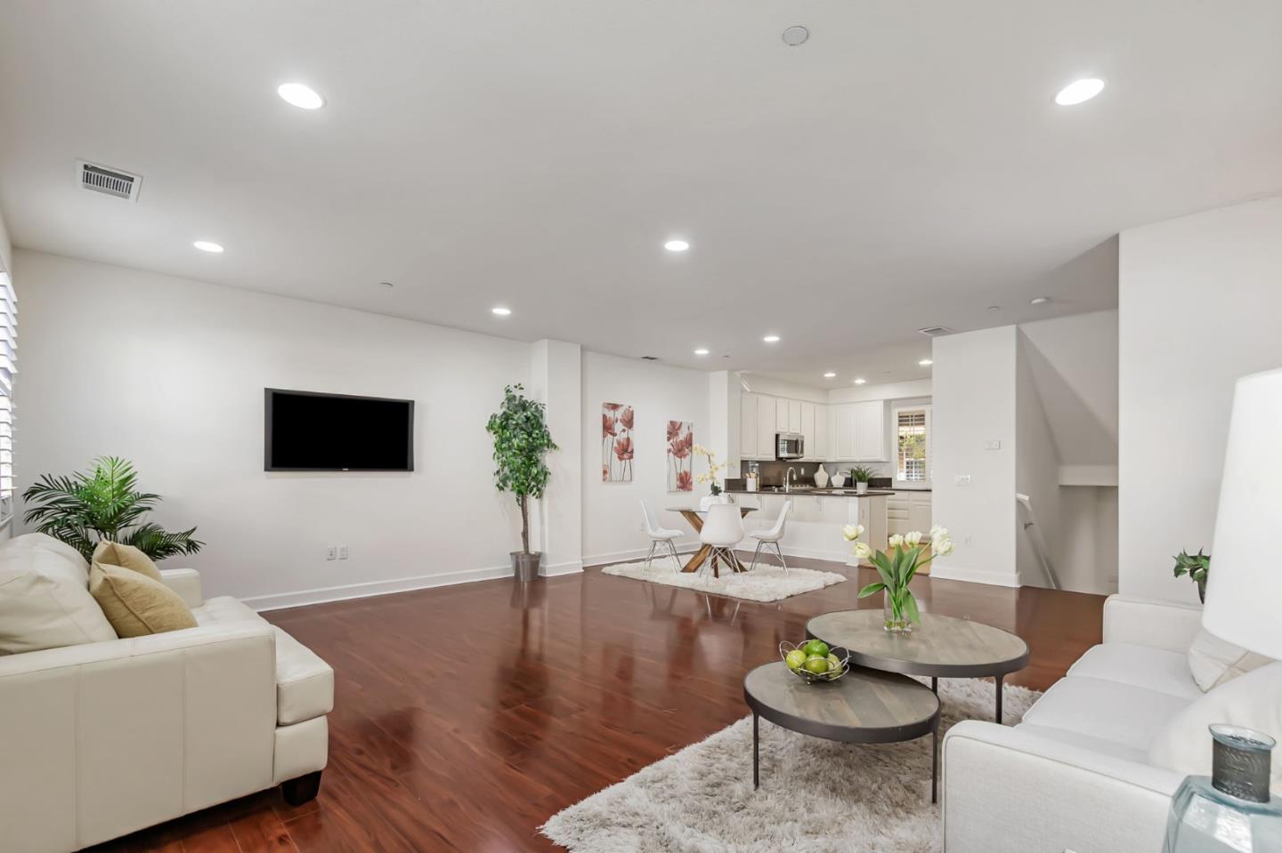 1142 Mente Linda Loop Milpitas, CA 95035 - Photo 6 of 36 a living room with furniture kitchen view and a potted plant