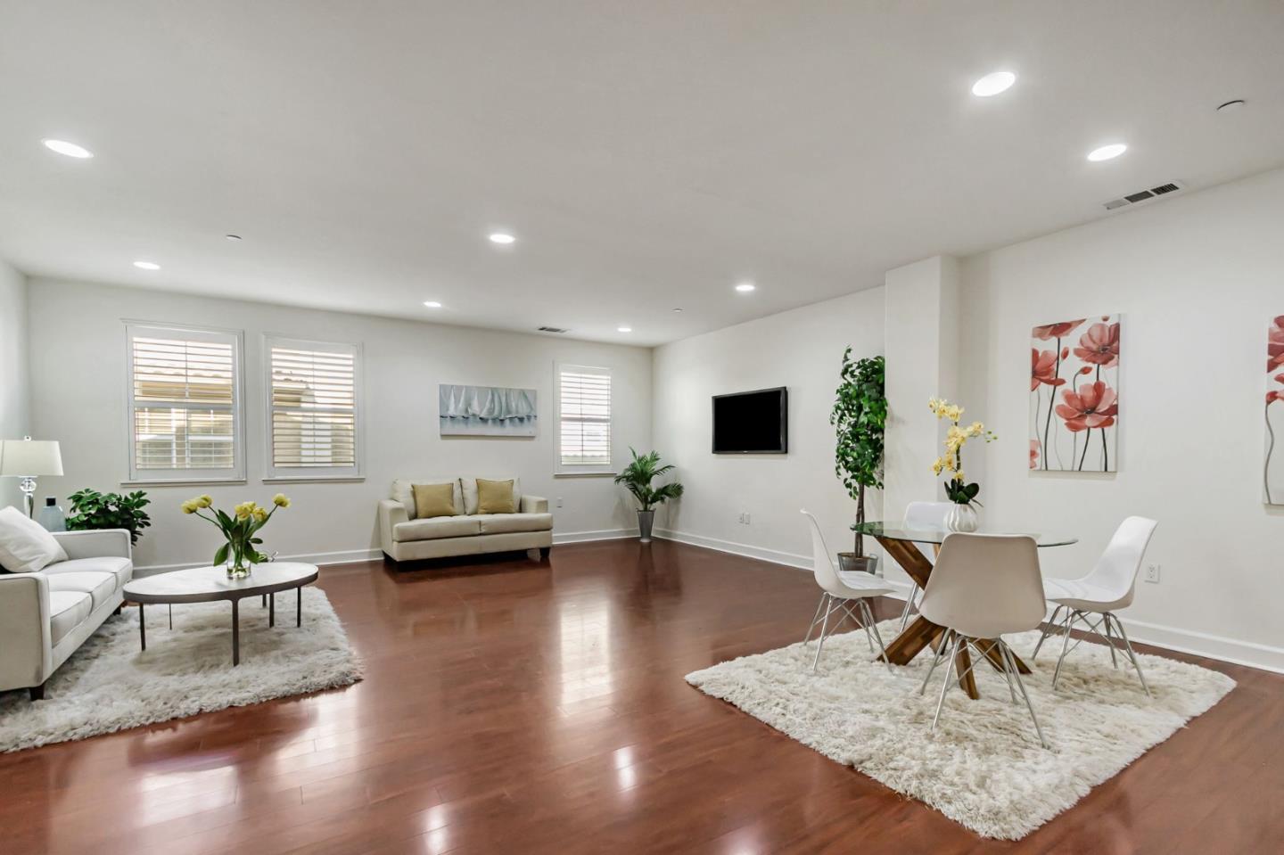 1142 Mente Linda Loop Milpitas, CA 95035 - Photo 10 of 36 a living room with furniture and wooden floor