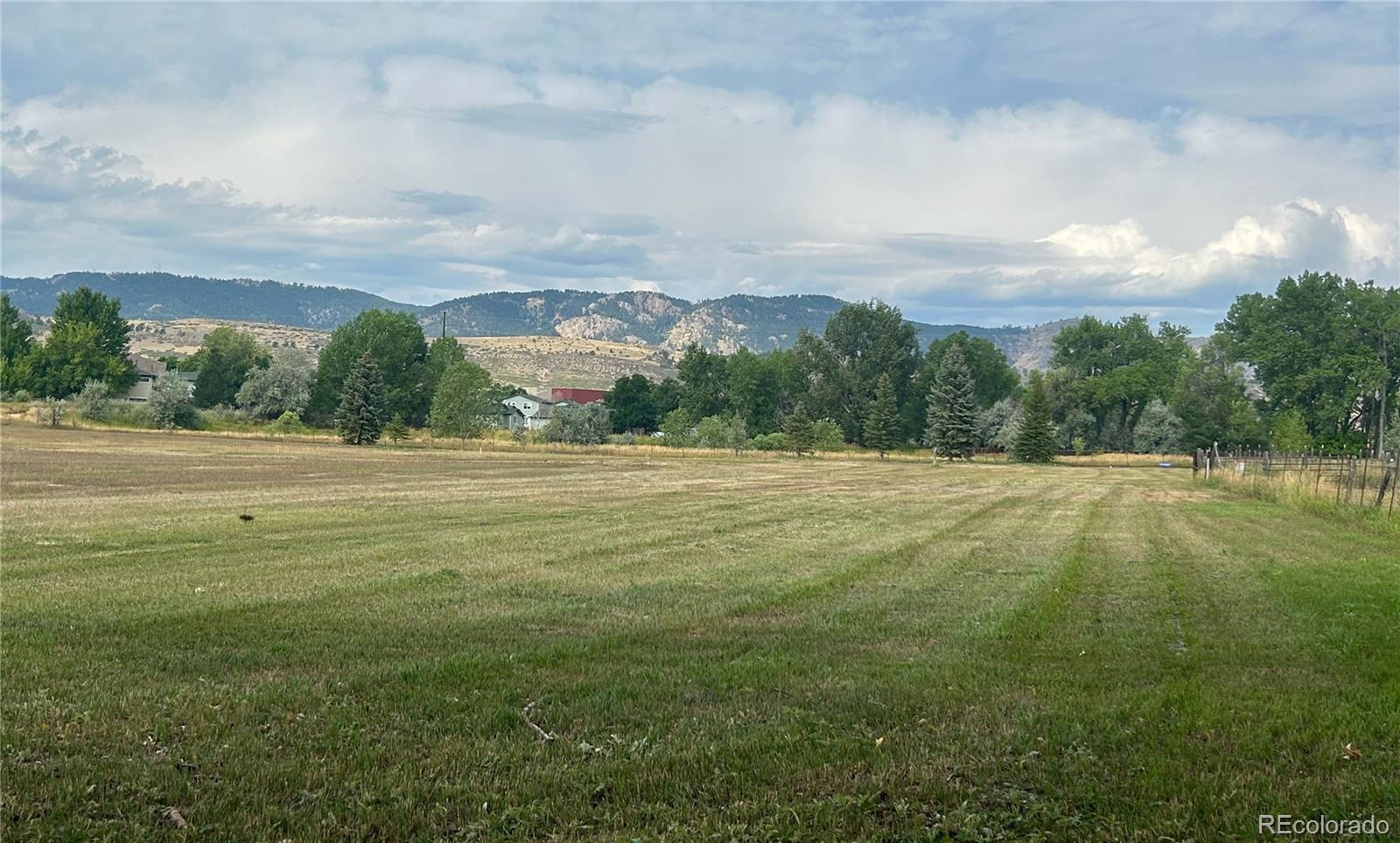 2895 Orchard Place Fort Collins, CO 80521 - Photo 14 of 15 a view of an outdoor space and a yard