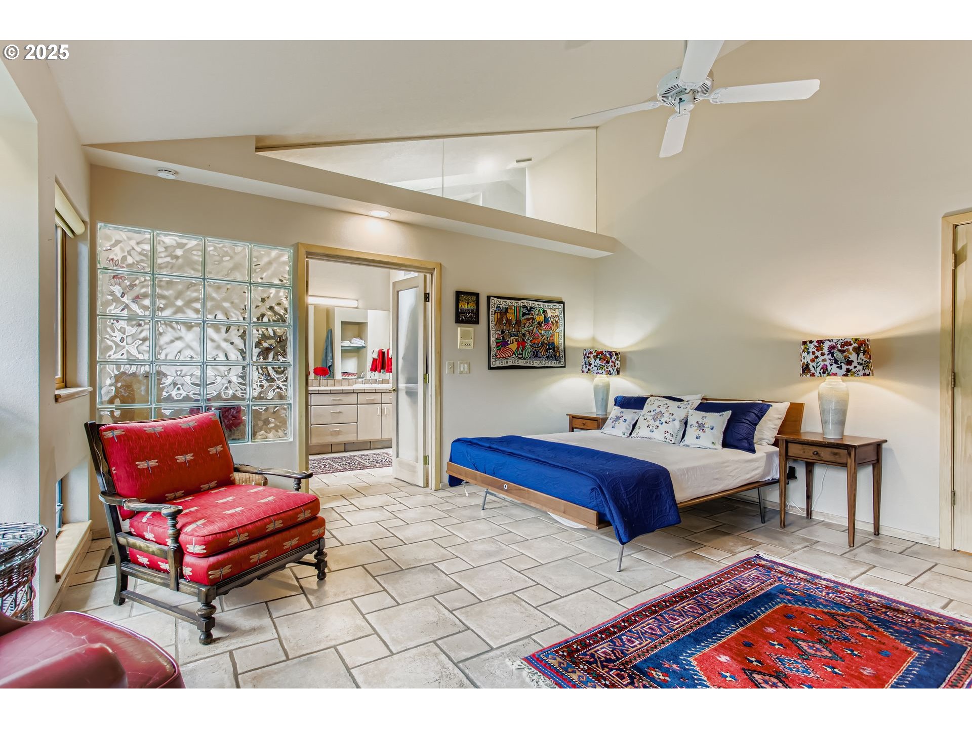 3902 Southwest Mt Adams Drive Portland, OR 97239 - Photo 15 of 38 a living room with furniture a rug and a large window