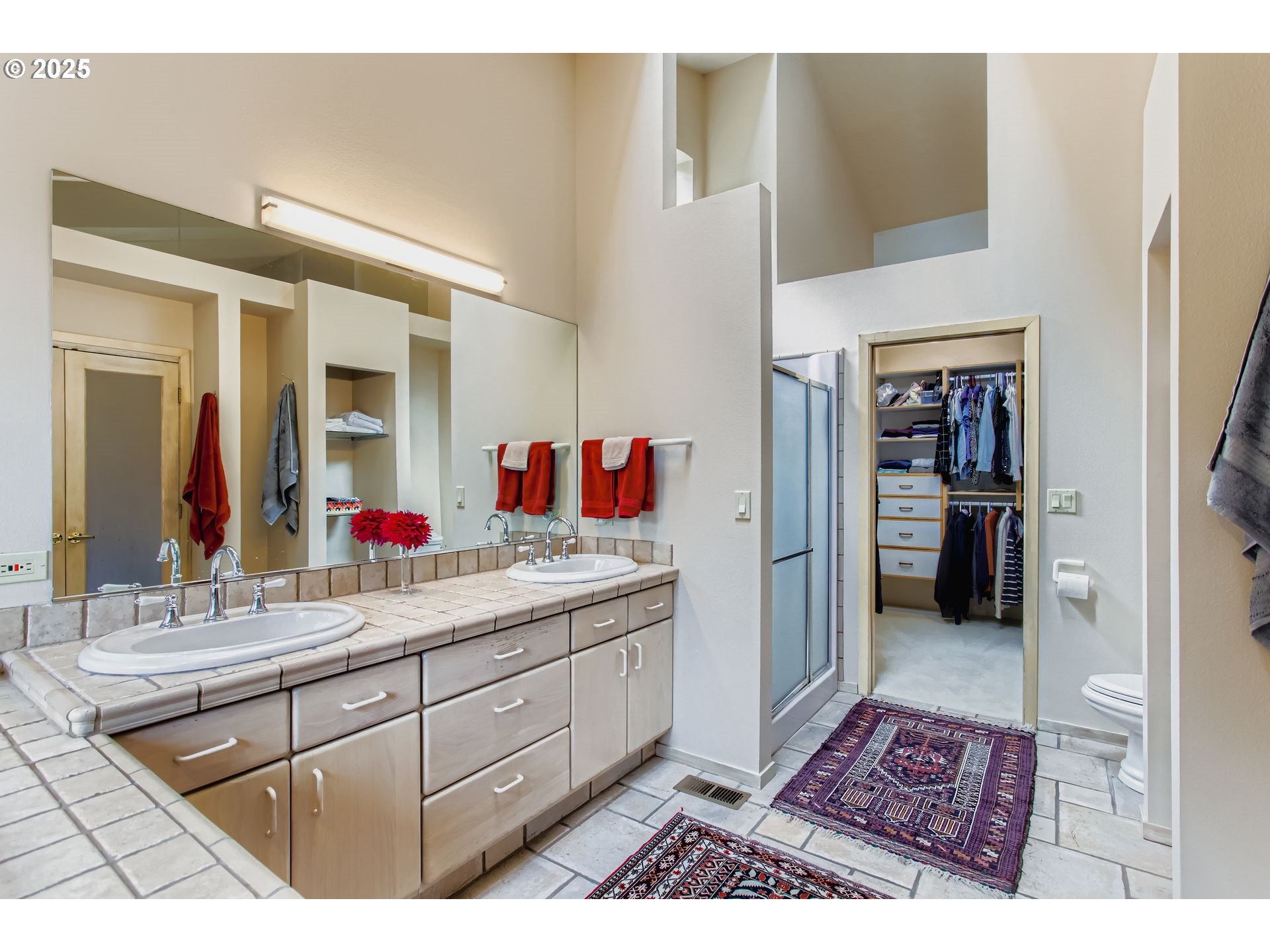 3902 Southwest Mt Adams Drive Portland, OR 97239 - Photo 17 of 38 a bathroom with a sink and a mirror