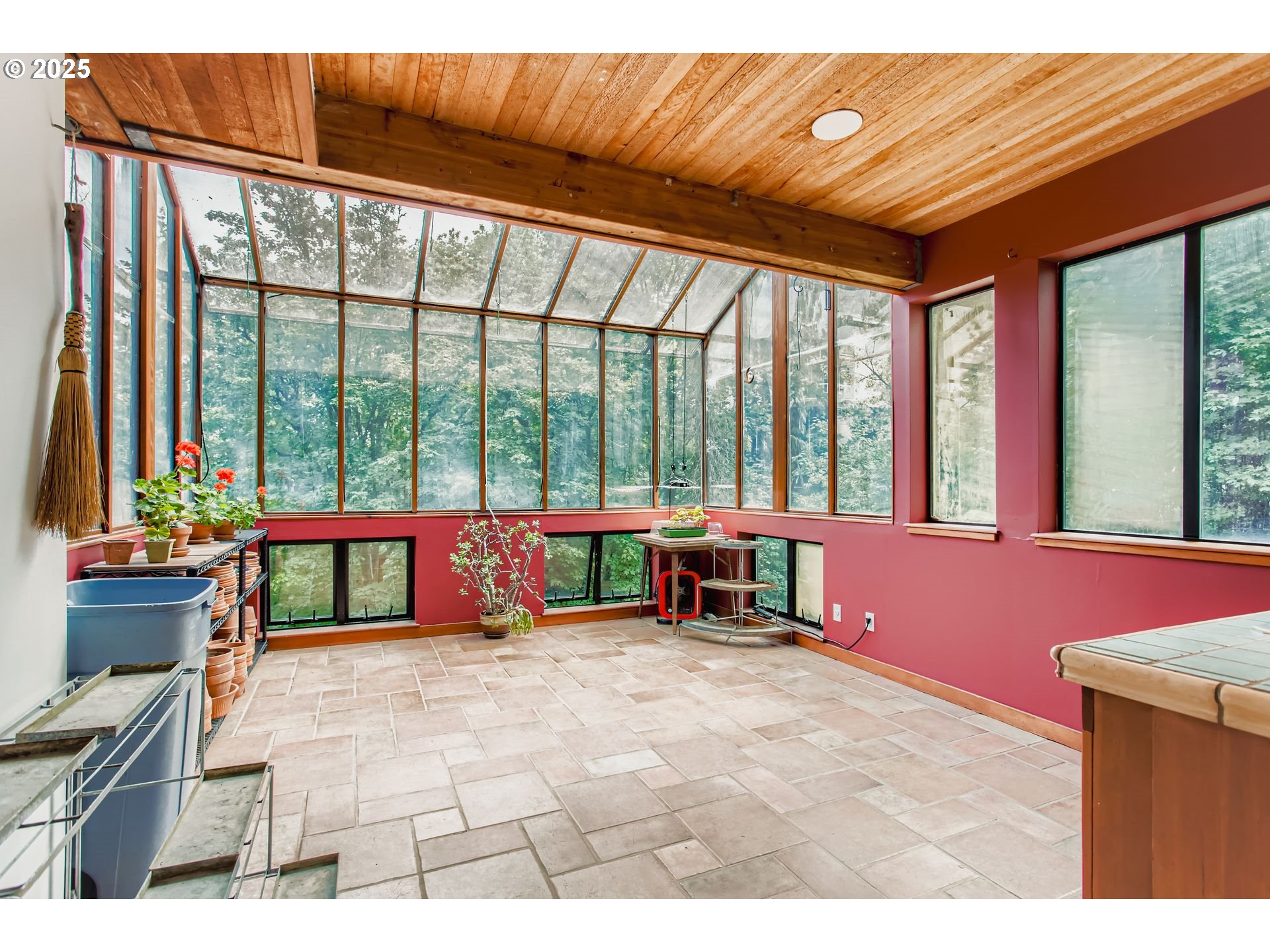 3902 Southwest Mt Adams Drive Portland, OR 97239 - Photo 20 of 38 a view of a room with furniture and a large window