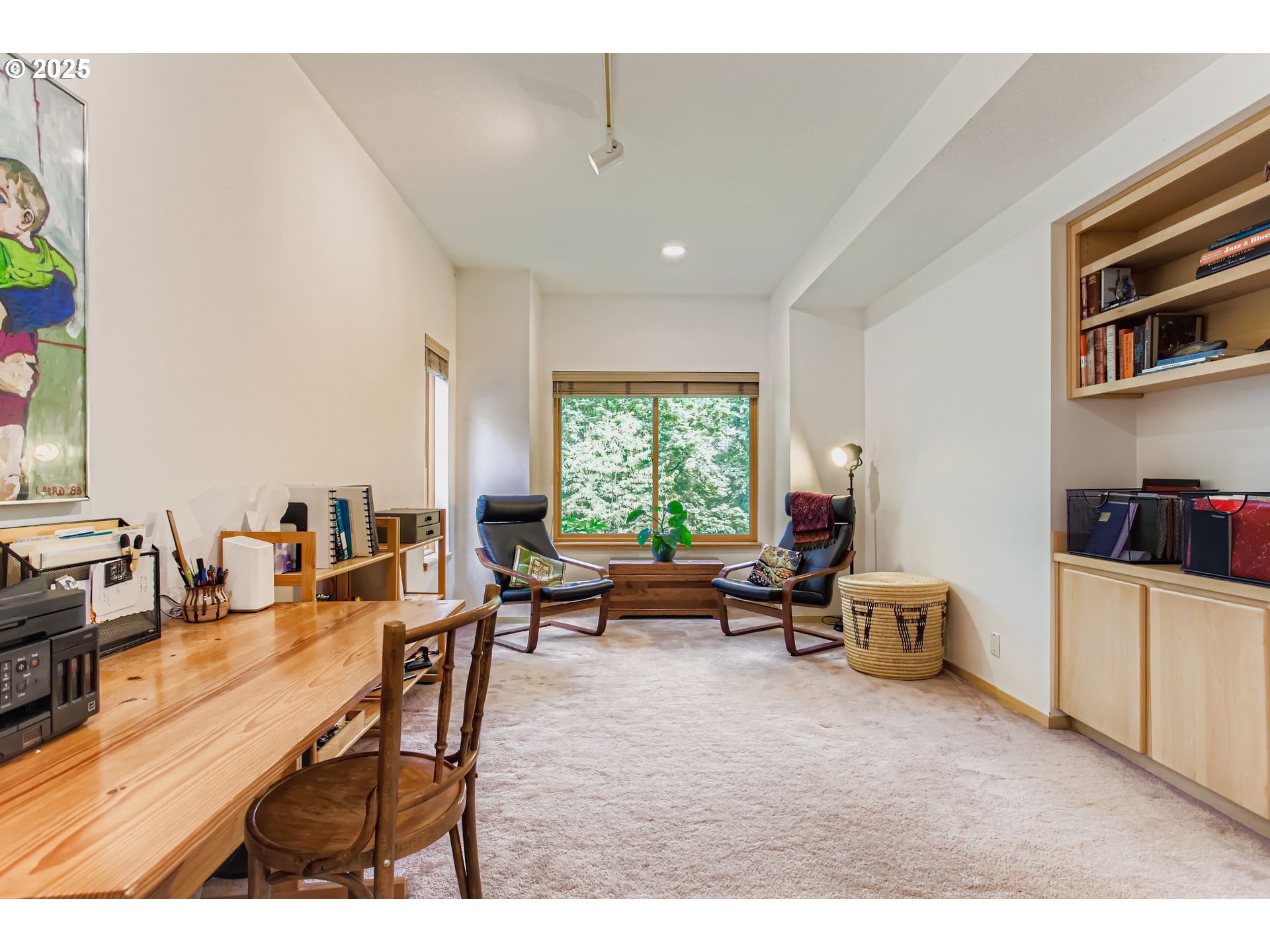 3902 Southwest Mt Adams Drive Portland, OR 97239 - Photo 23 of 38 a living room with furniture and a window