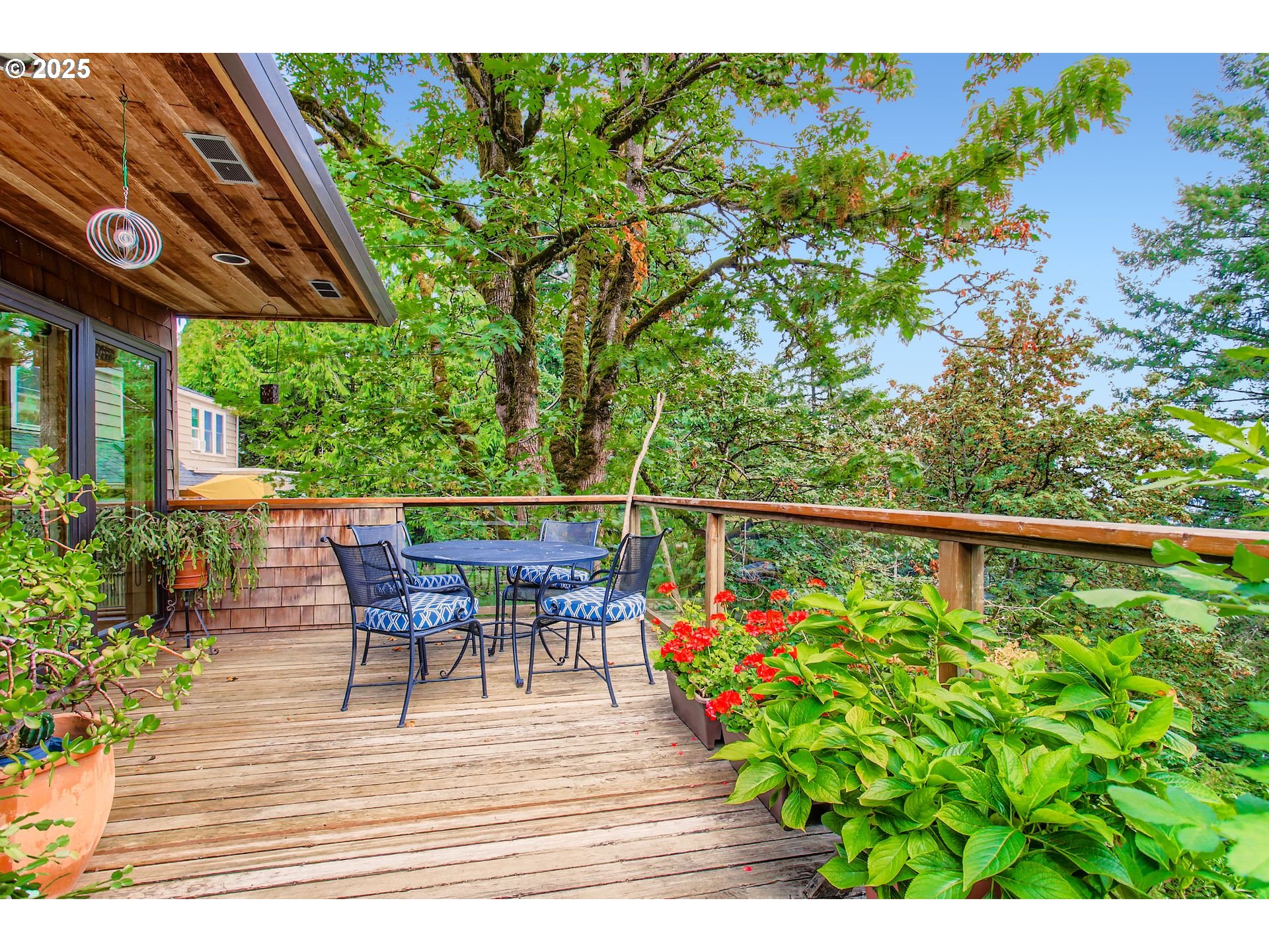 3902 Southwest Mt Adams Drive Portland, OR 97239 - Photo 24 of 38 a view of a chairs and table in the patio