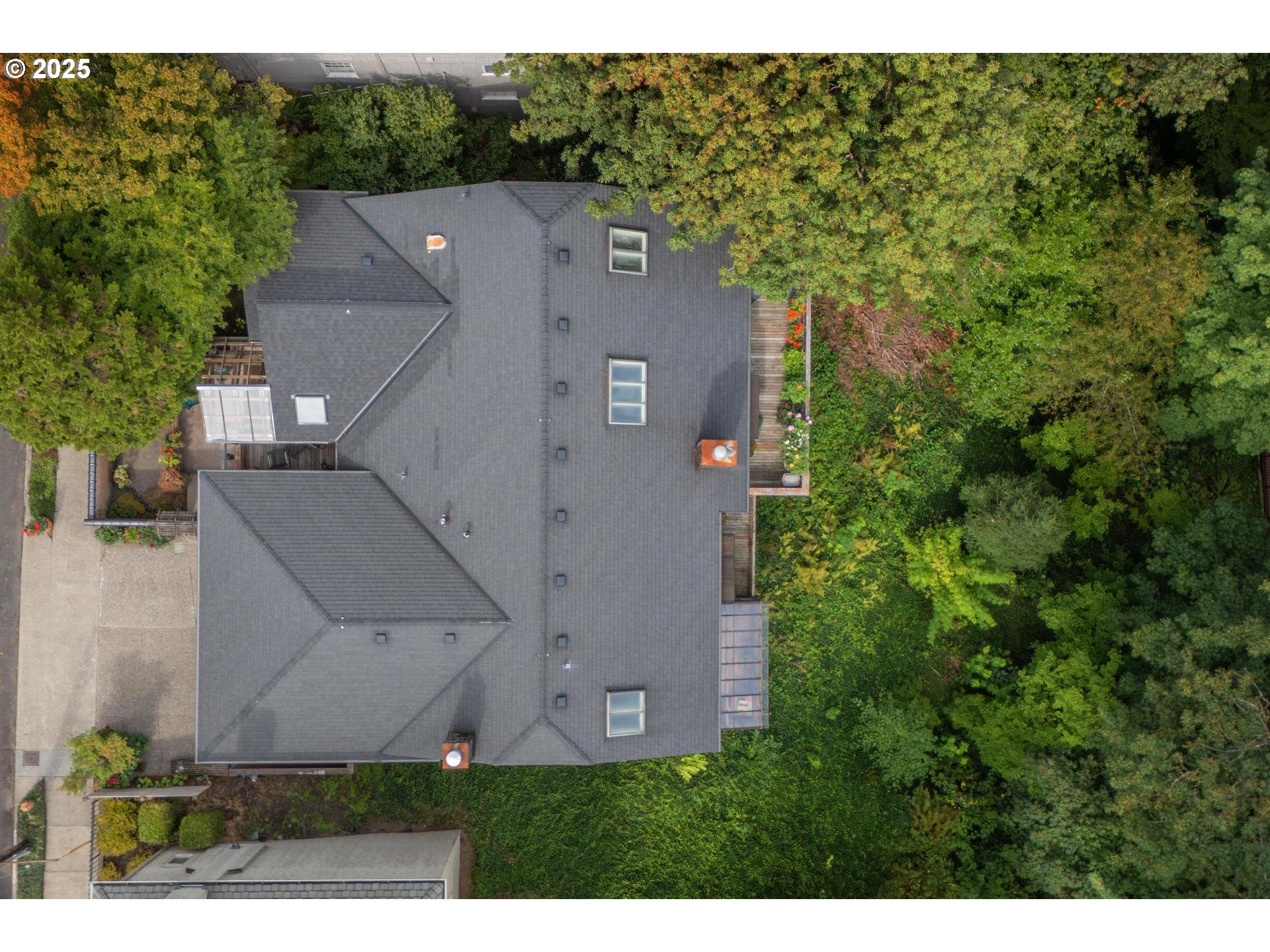 3902 Southwest Mt Adams Drive Portland, OR 97239 - Photo 26 of 38 an aerial view of a house with a yard