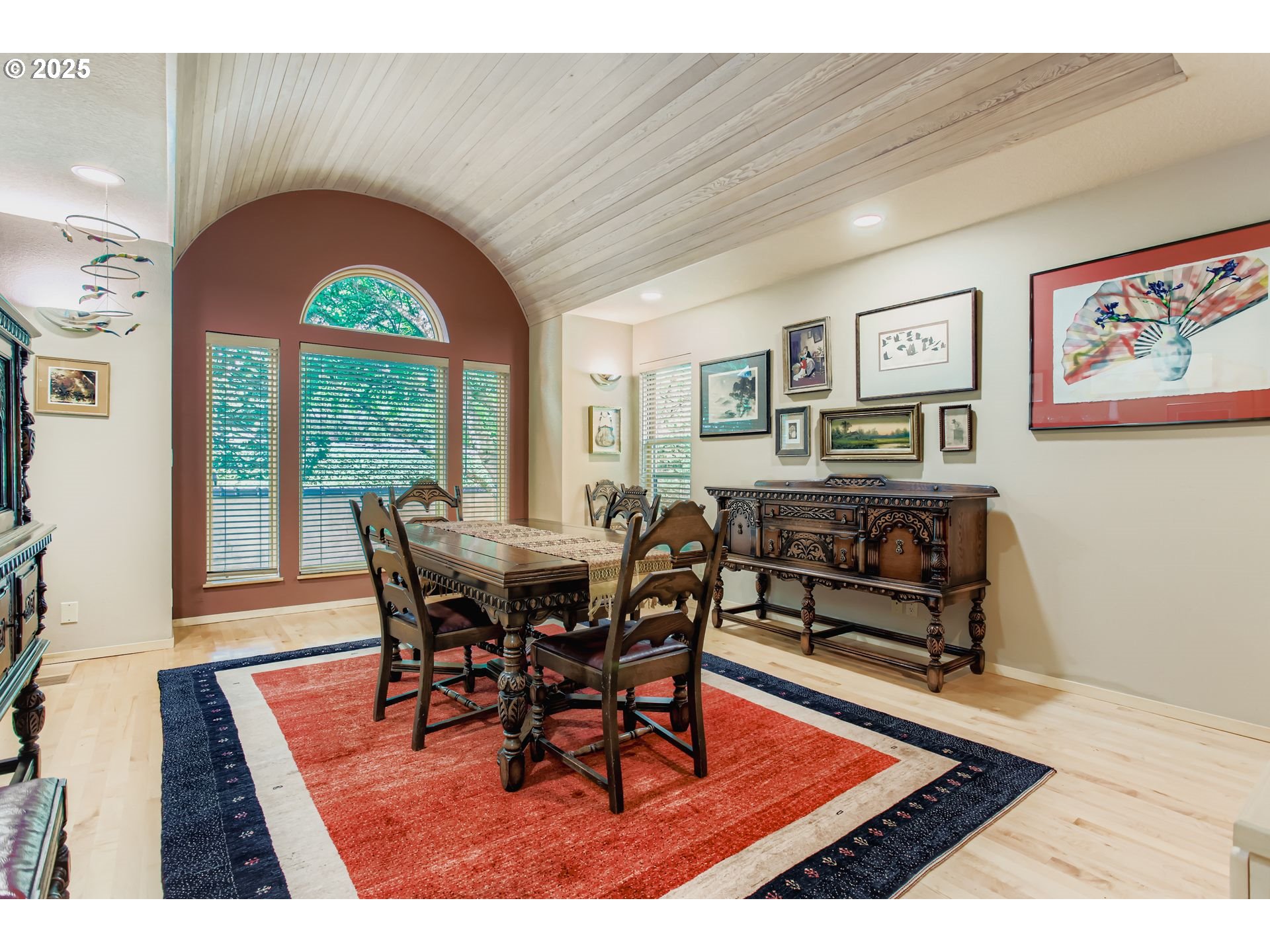 3902 Southwest Mt Adams Drive Portland, OR 97239 - Photo 10 of 38 a living room with furniture and a rug