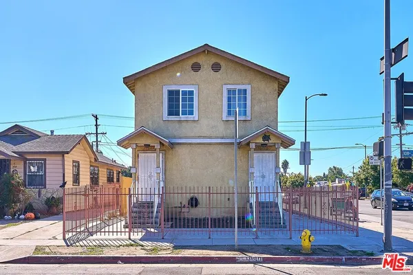 a front view of a house with a porch