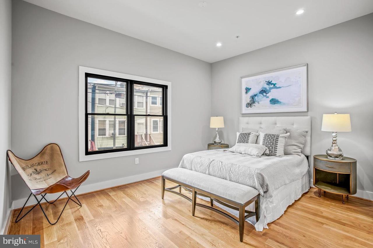 1420 Staples Street Northeast, Unit 2 Washington, DC 20002 - Photo 16 of 17 a bedroom with a bed and window