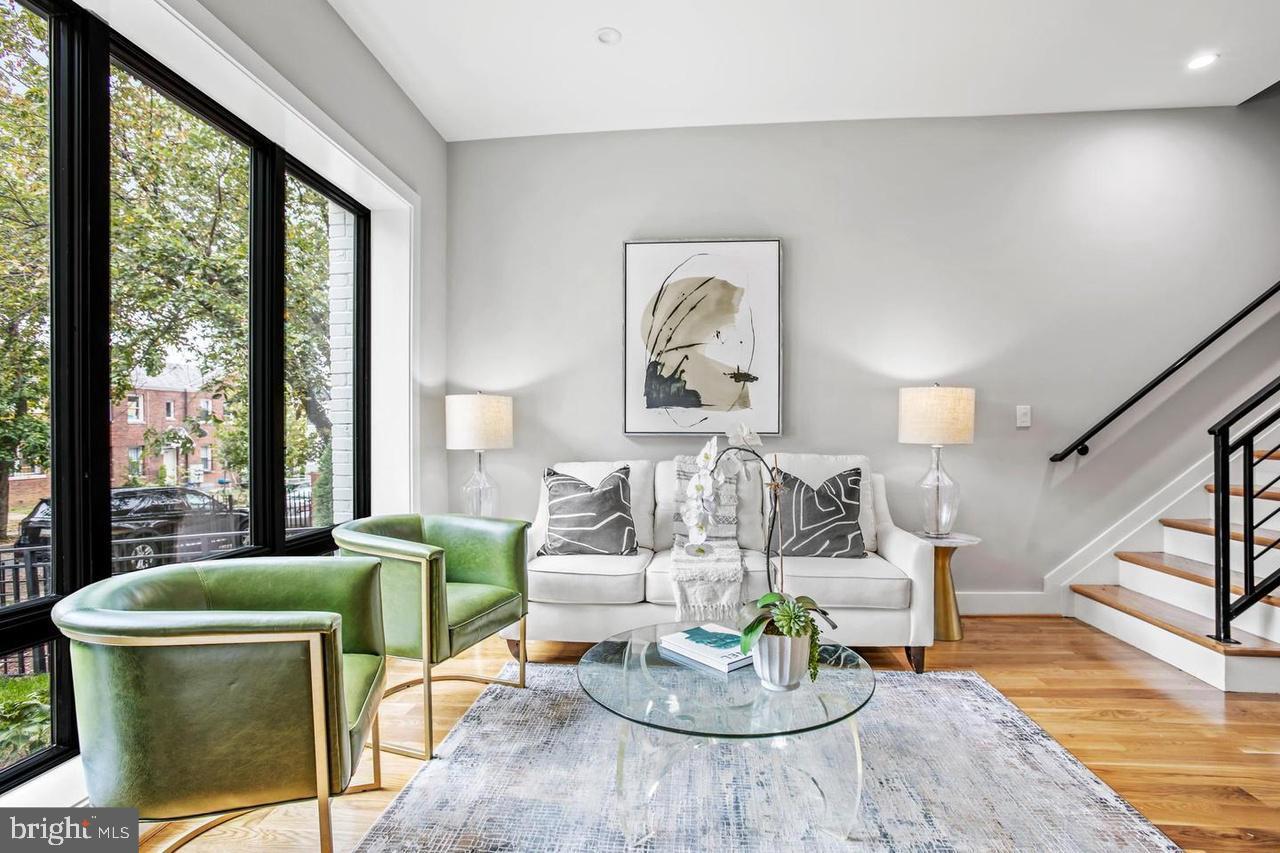1420 Staples Street Northeast, Unit 2 Washington, DC 20002 - Photo 3 of 17 a living room with furniture and a large window
