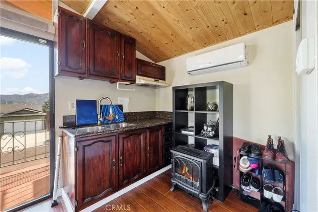 a bed room with a bed and a chair