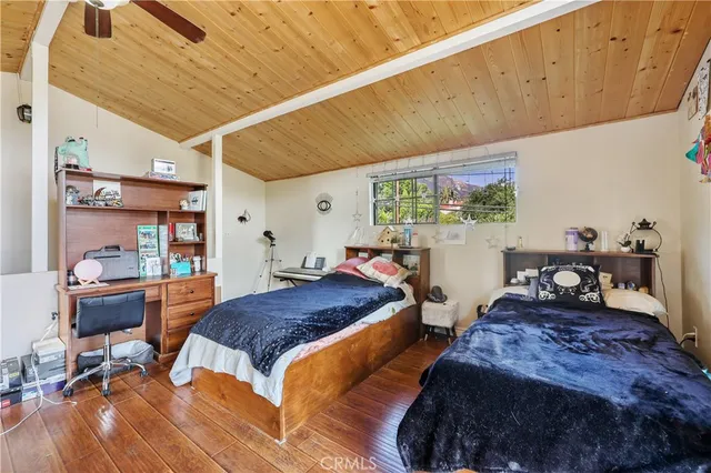 a view of a balcony with floor to ceiling windows
