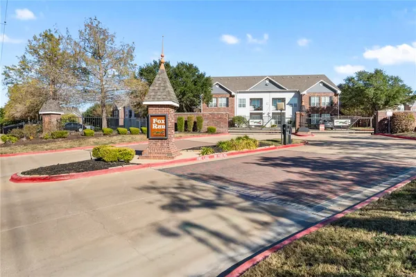 a front view of residential houses with street