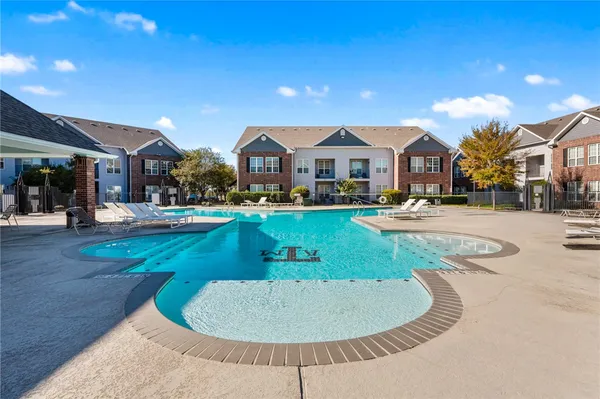 a view of a house with a swimming pool