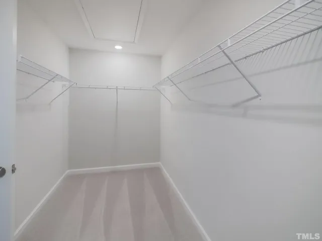 a view of a room with racks on the wall