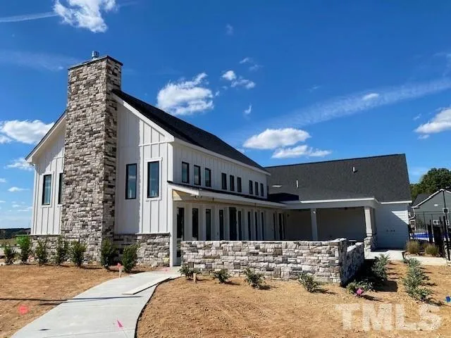 a view of a house with a patio