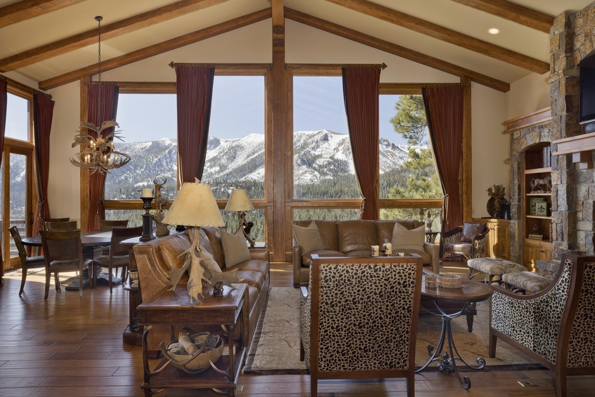 269 Juniper Road Mammoth Lakes, CA 93546 - Photo 3 of 56 a living room with furniture and floor to ceiling windows