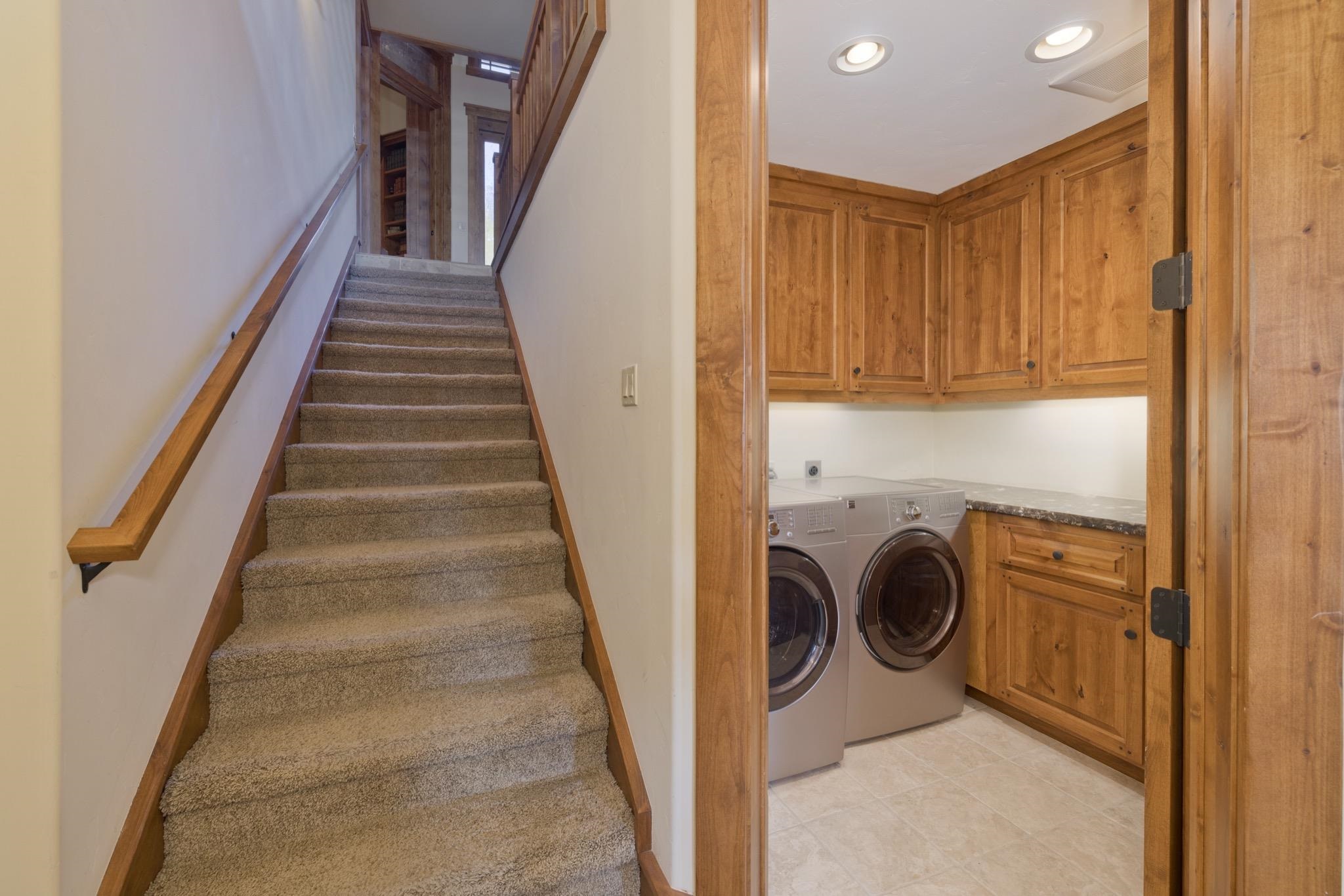 269 Juniper Road Mammoth Lakes, CA 93546 - Photo 35 of 56 a view of a hallway with washer and dryer