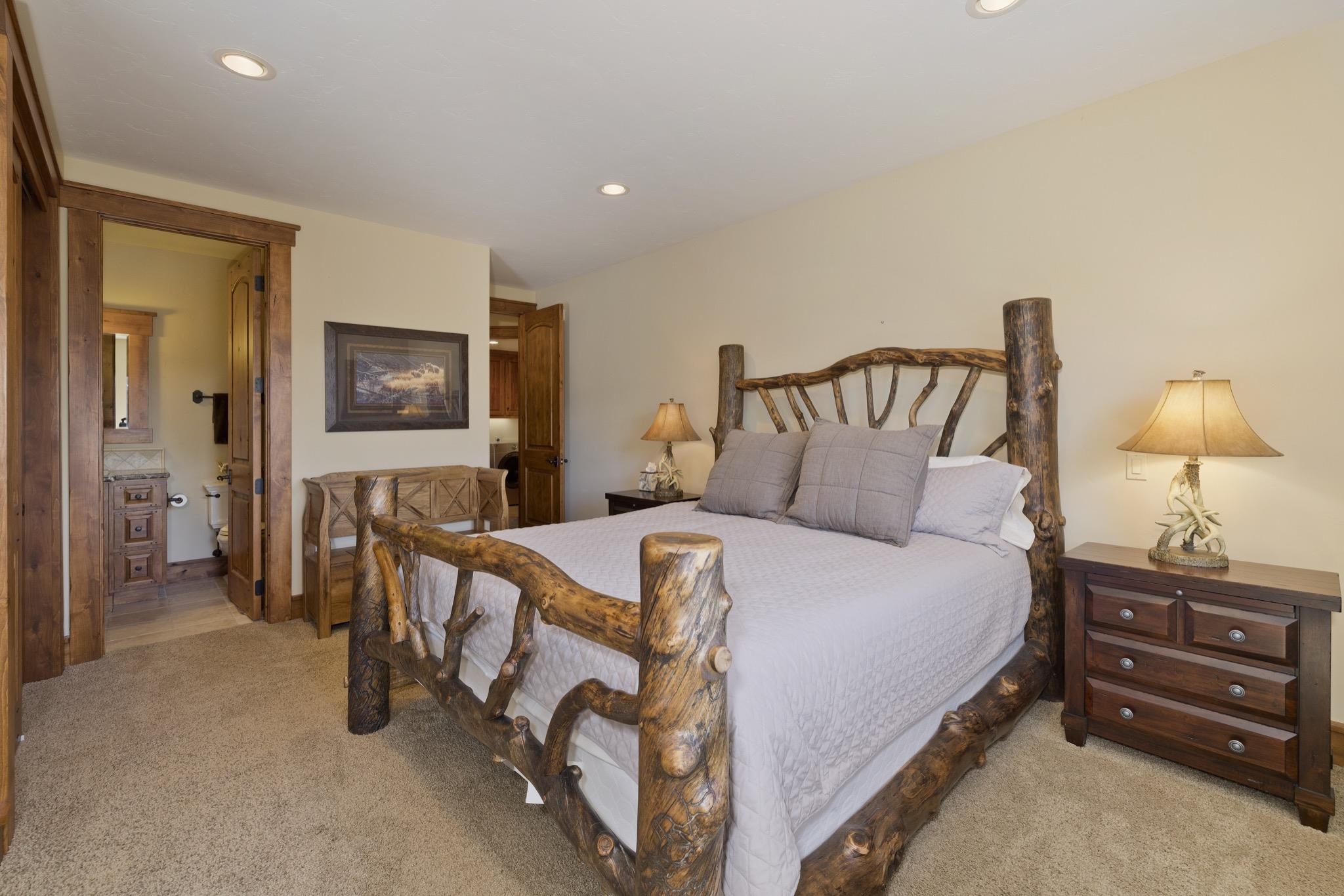 269 Juniper Road Mammoth Lakes, CA 93546 - Photo 43 of 56 a bedroom with a bed and a tv